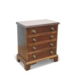 A GEORGE III STYLE MAHOGANY MINIATURE CHEST OF DRAWERS