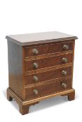 A GEORGE III STYLE MAHOGANY MINIATURE CHEST OF DRAWERS