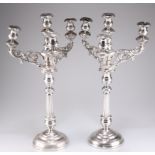 A PAIR OF 19TH CENTURY CONTINENTAL SILVER FOUR-LIGHT CANDELABRA