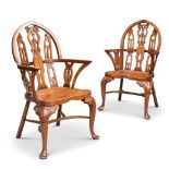 A PAIR OF GOTHIC STYLE STAINED BEECH WINDSOR ARMCHAIRS