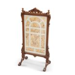 ATTRIBUTED TO GILLOWS, A VICTORIAN OAK COUNTRY HOUSE FIRESCREEN