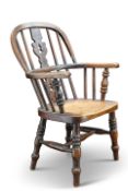 A 19TH CENTURY ELM AND OAK CHILD’S WINDSOR CHAIR