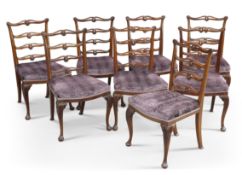 A SET OF EIGHT GEORGE III STYLE MAHOGANY DINING CHAIRS