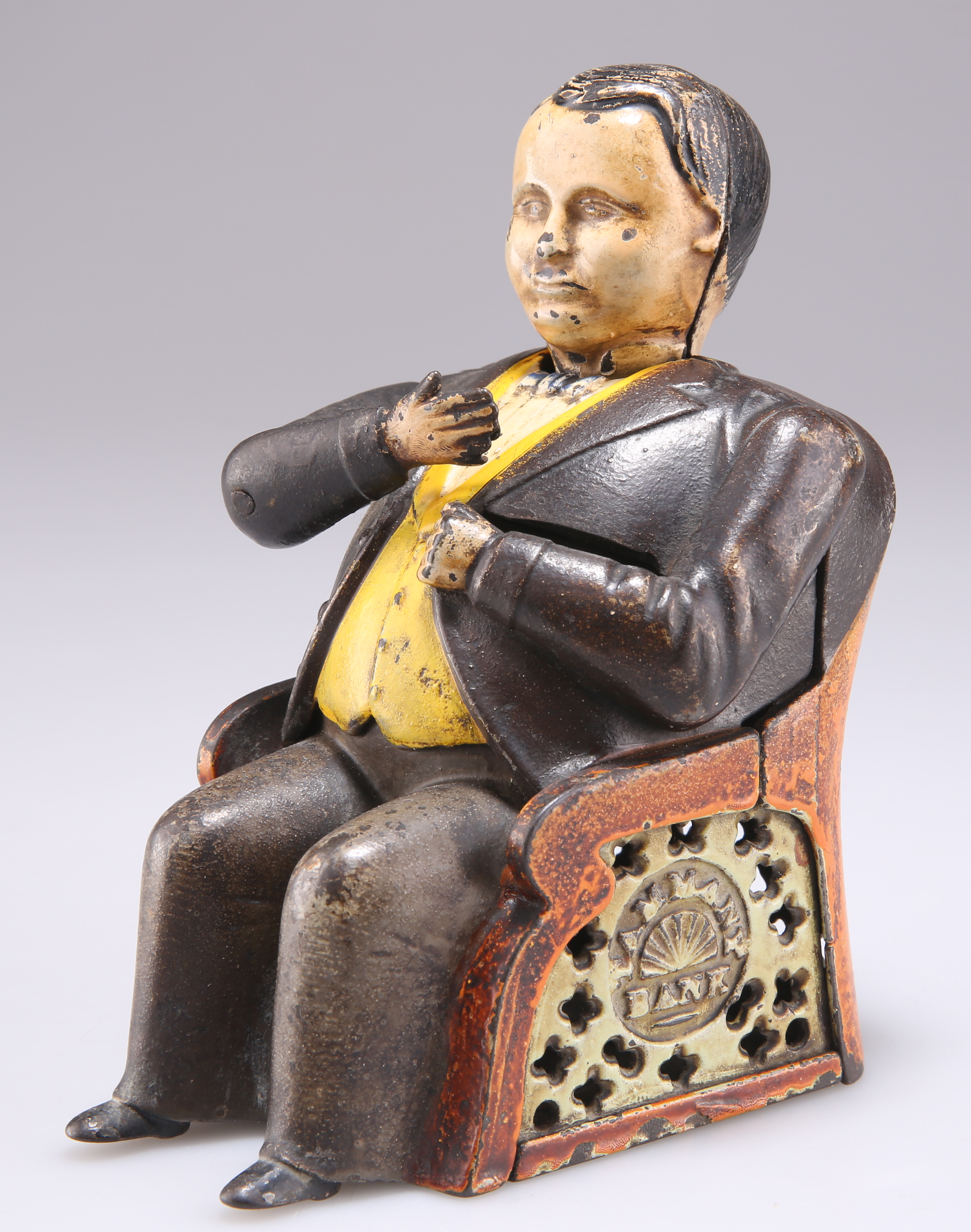 A 19TH CENTURY AMERICAN NOVELTY CAST IRON TAMMANY BANK MONEY BOX