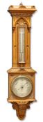 AN OAK CASED BAROMETER AND THERMOMETER