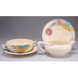 A CLARICE CLIFF BIZARRE 'AUREA' PATTERN LYNTON SOUP BOWL AND SAUCER, AND A MILK JUG AND SAUCER