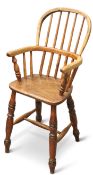 A 19TH CENTURY OAK AND ELM CHILD’S WINDSOR HIGH CHAIR
