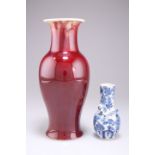 A CHINESE FLAMBÉ GLAZE VASE AND A BLUE AND WHITE DRAGON BOTTLE VASE