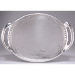 ARCHIBALD KNOX (1864-1933) FOR LIBERTY & CO, A SMALL TUDRIC PEWTER TWO HANDLED TRAY, NO.0311