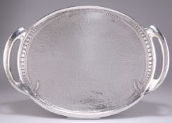 ARCHIBALD KNOX (1864-1933) FOR LIBERTY & CO, A SMALL TUDRIC PEWTER TWO HANDLED TRAY, NO.0311