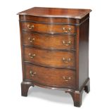 A GEORGE III STYLE MAHOGANY SERPENTINE BACHELOR’S CHEST, EARLY 20TH CENTURY