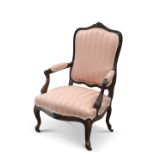 A 19TH CENTURY ROSEWOOD OPEN ARMCHAIR, IN LOUIS XV STYLE