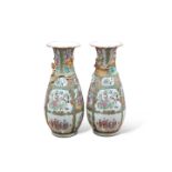 A LARGE PAIR OF 19TH CENTURY CANTONESE FAMILLE ROSE VASES