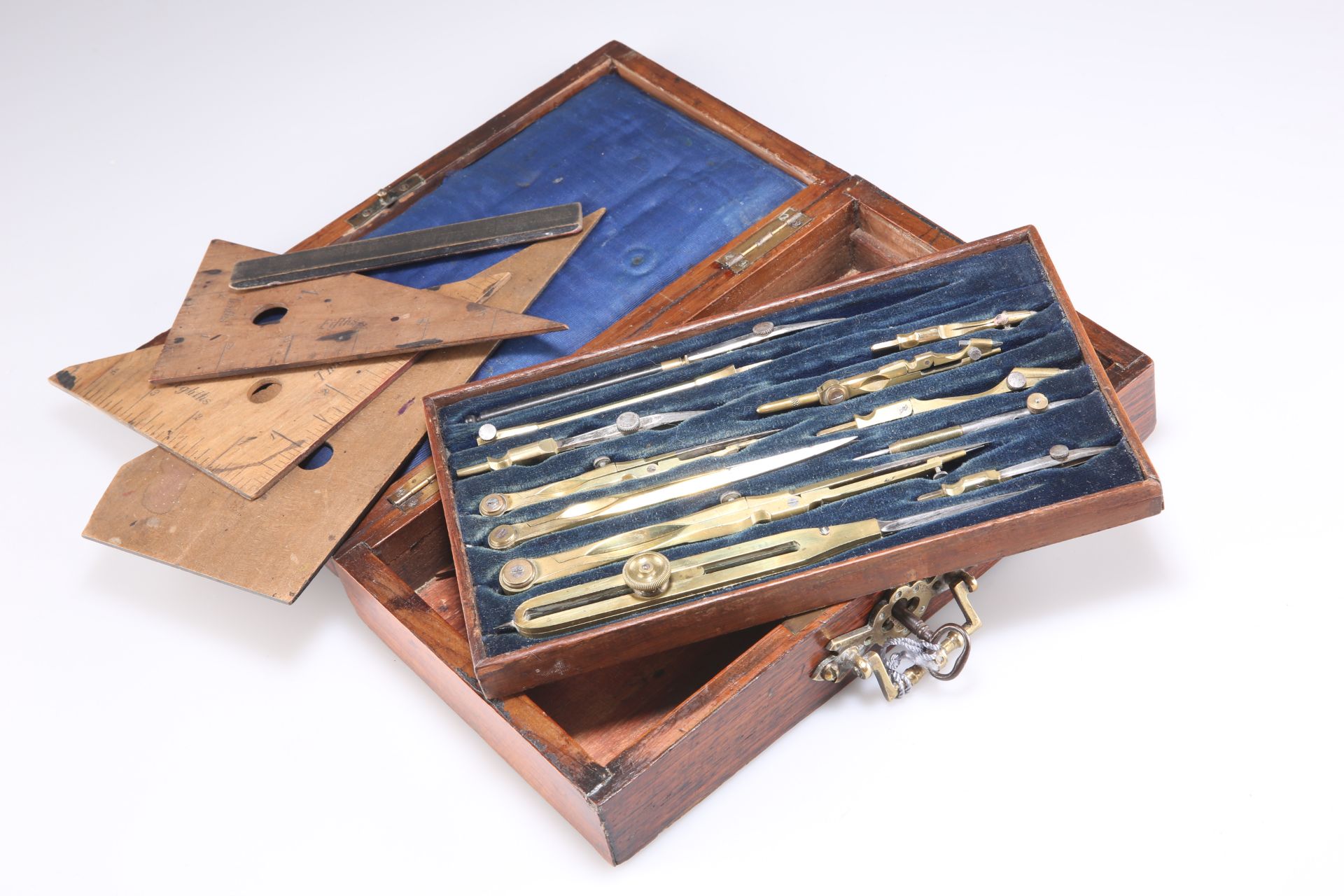 A ROSEWOOD CASED SET OF BRASS-MOUNTED DRAWING INSTRUMENTS