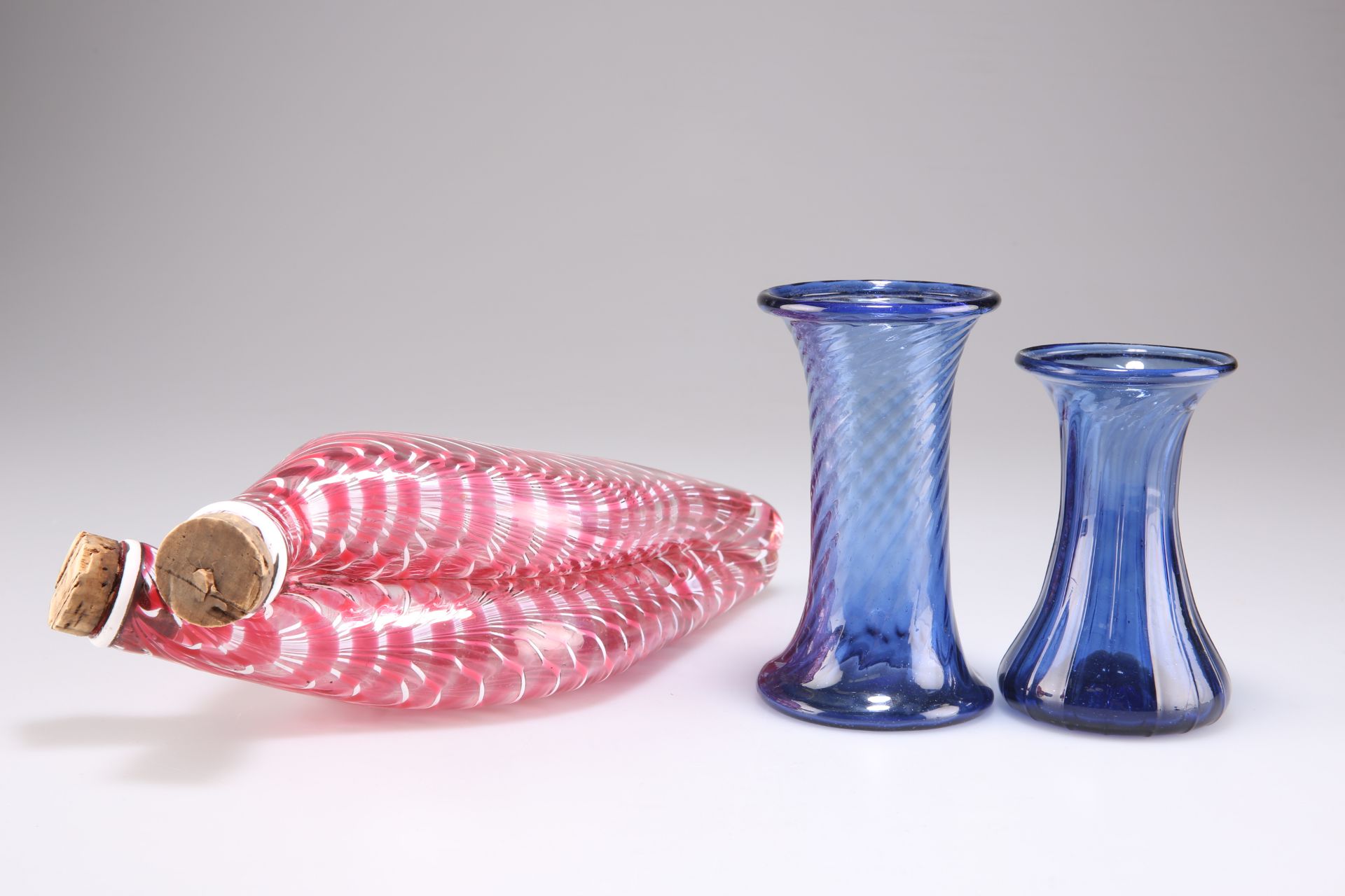 A 19TH CENTURY NAILSEA GLASS DOUBLE GIMMEL FLASK AND TWO GEORGIAN GLASS VASES
