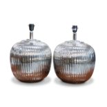 A PAIR OF CONTEMPORARY CHROME EFFECT LAMP BASES