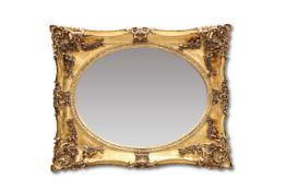 A LARGE PERIOD STYLE GILT FRAMED MIRROR