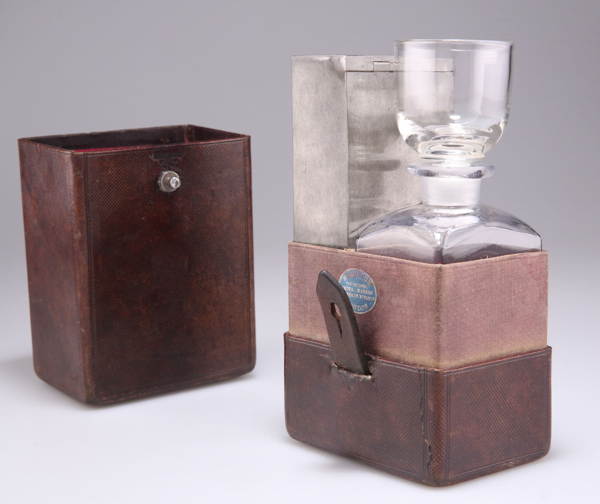 A VICTORIAN 'RAILWAY COMPANION' TRAVELLING DECANTER AND BISCUIT BOX SET