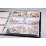 AN ALBUM OF RAPHAEL TUCK TOPOGRAPHICAL POSTCARDS