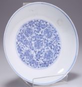 A CHINESE BLUE AND WHITE SAUCER DISH