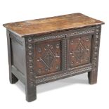 A 17TH CENTURY SMALL OAK COFFER