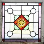 A LEADED STAINED GLASS WINDOW