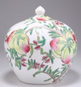 A CHINESE FAMILLE ROSE VASE AND COVER