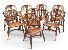 A GOOD SET OF EIGHT PERIOD STYLE YEW AND OAK WINDSOR CHAIRS