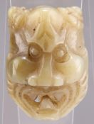 A CHINESE CARVED JADE BELT BUCKLE