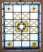 A LEADED STAINED GLASS WINDOW