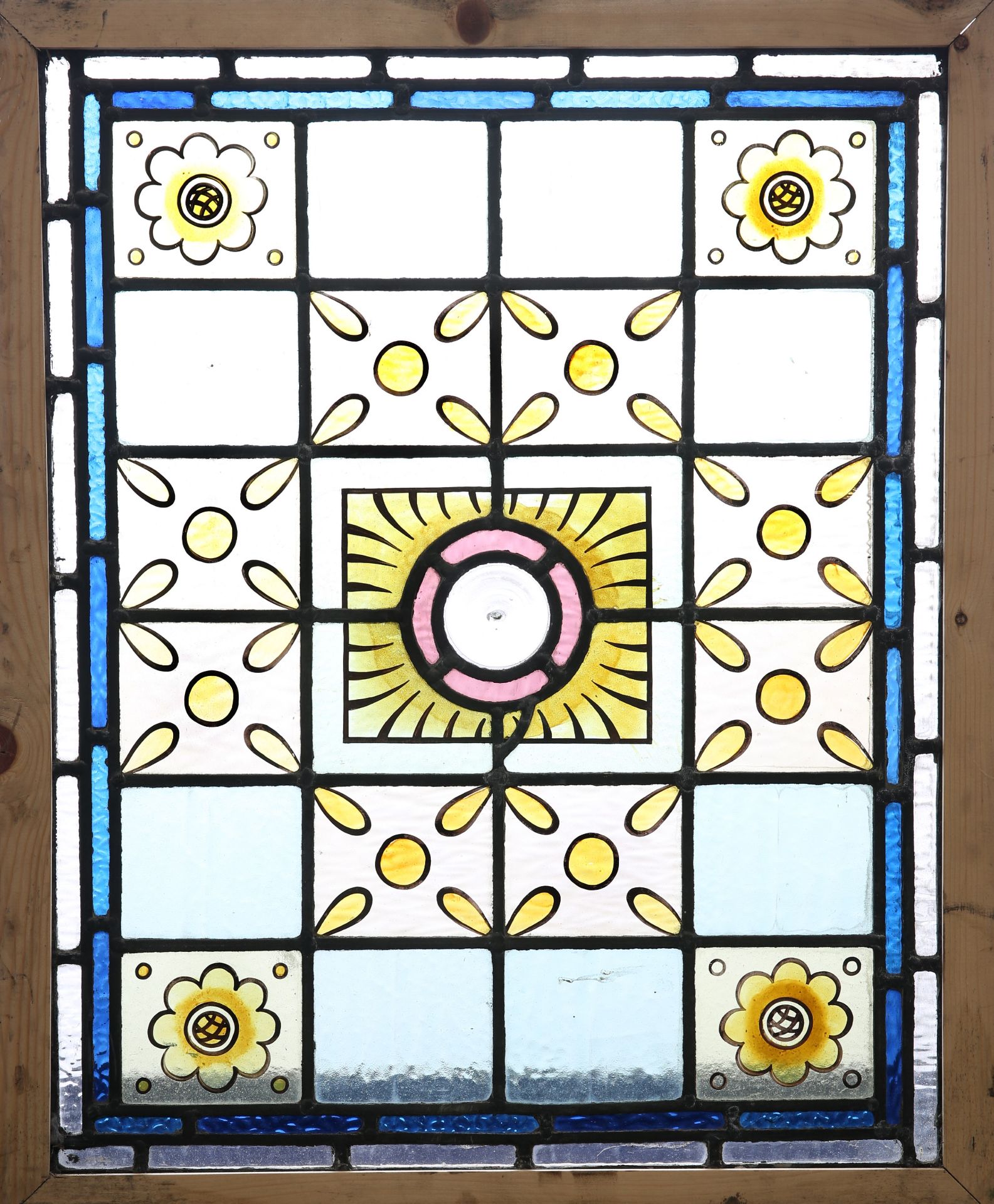 A LEADED STAINED GLASS WINDOW