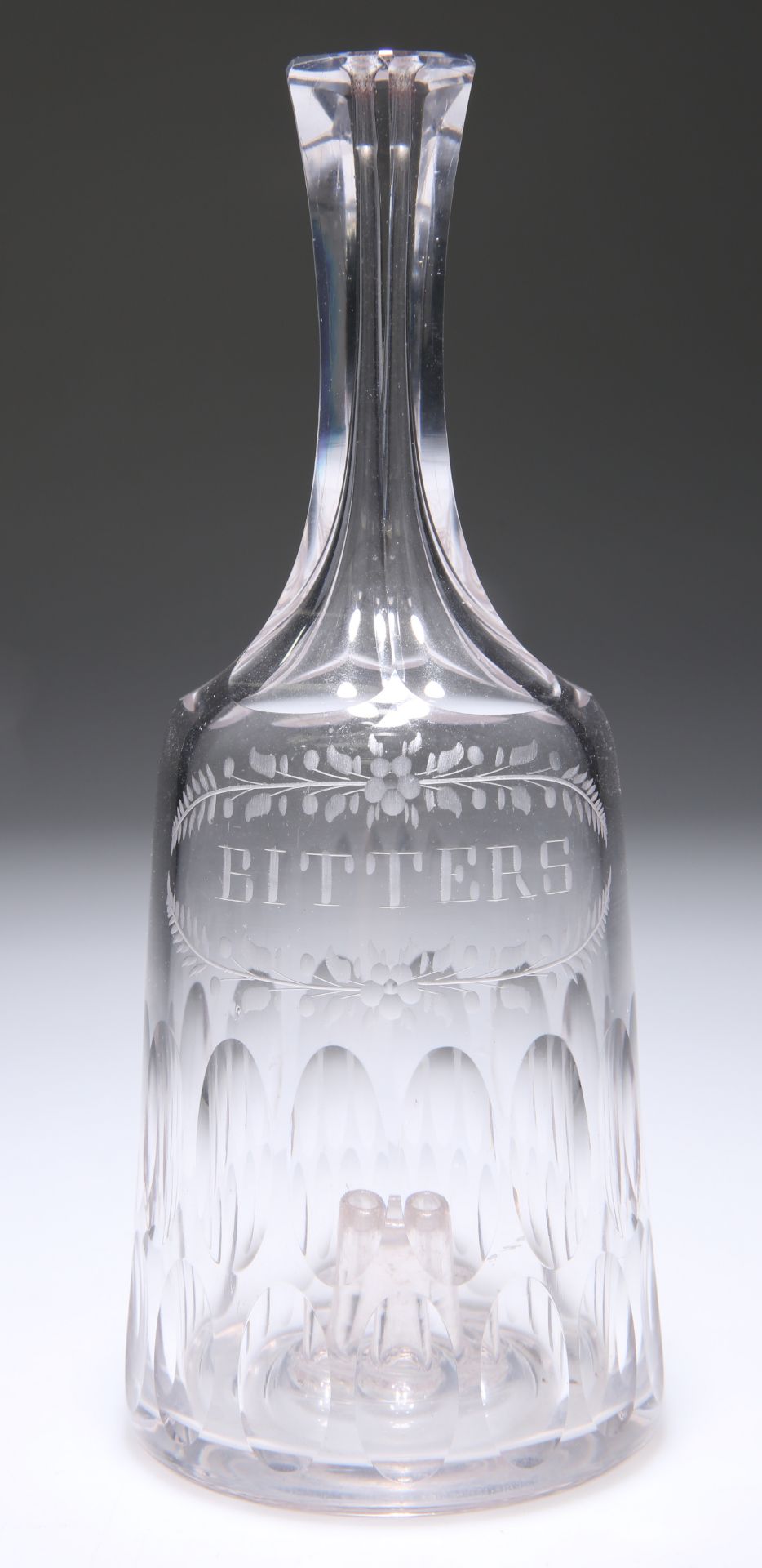 A GEORGIAN GLASS BITTERS BOTTLE