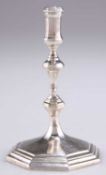 A VICTORIAN CAST SILVER TAPERSTICK