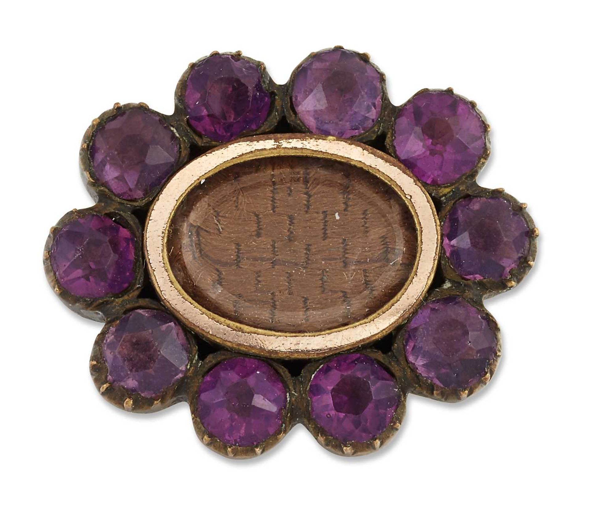 AN EARLY 19TH CENTURY PASTE AND HAIRWORK MOURNING BROOCH