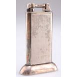 A DUNHILL SILVER-PLATED TABLE LIGHTER