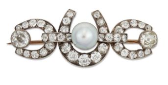 A LATE 19TH CENTURY NATURAL PEARL AND DIAMOND HORSESHOE BROOCH