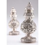 A PAIR OF 19TH CENTURY INDIAN SILVER PEPPER POT