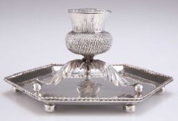 AN ARTS AND CRAFTS SILVER INKWELL AND A STAND