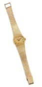 A 9 CARAT GOLD BUECHE GIROD BRACELET WATCH