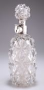 A GEORGE V SILVER-MOUNTED CUT-GLASS DECANTER