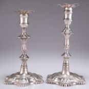 TWO 18TH CENTURY CAST SILVER CANDLESTICKS