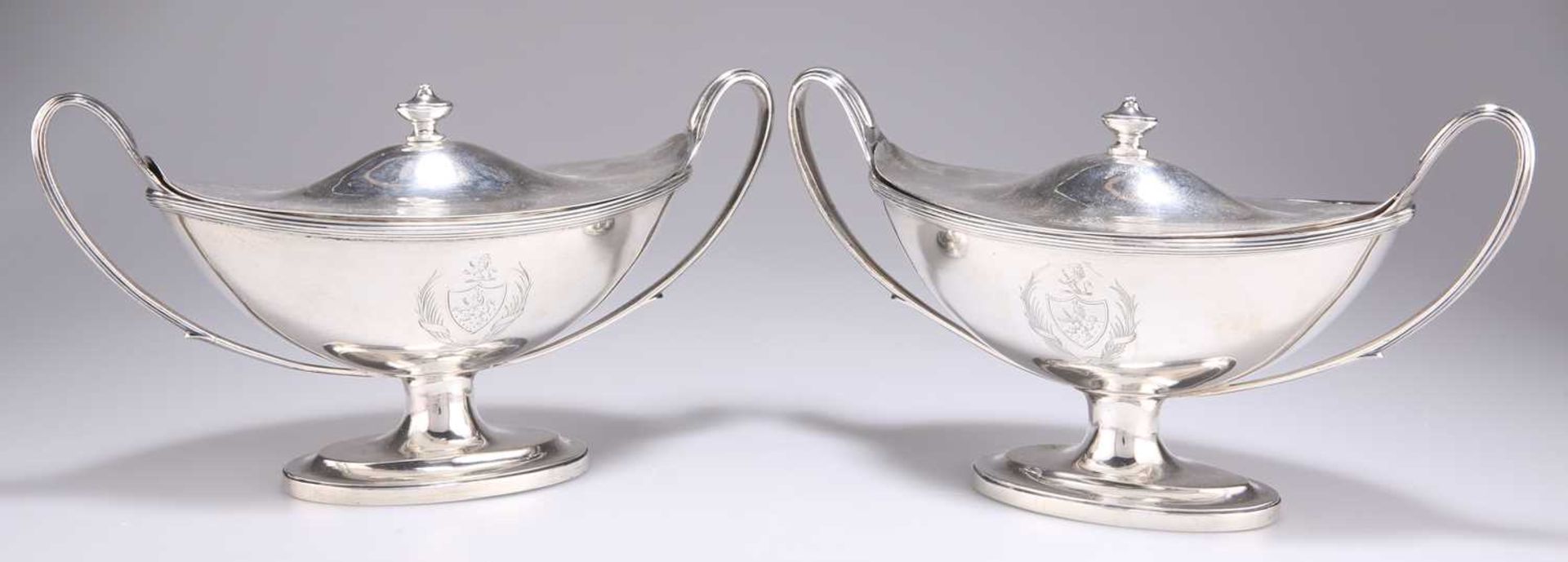 A PAIR OF GEORGE III SILVER SAUCE TUREENS