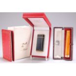 A 15 CARAT GOLD MOUNTED CHEROOT HOLDER AND A MUST DE CARTIER LACQUER LIGHTER