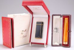 A 15 CARAT GOLD MOUNTED CHEROOT HOLDER AND A MUST DE CARTIER LACQUER LIGHTER