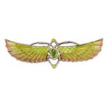 AN EGYPTIAN REVIVAL PLIQUE A JOUR ENAMEL AND PASTE WINGED SCARAB BROOCH