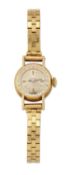 AN 18 CARAT GOLD LADY'S OMEGA BRACELET WATCH