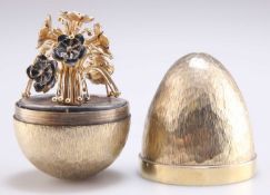 AN ELIZABETH II SILVER-GILT AND ENAMEL SURPRISE EGG