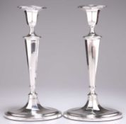 A PAIR OF GEORGE V SILVER CANDLESTICKS