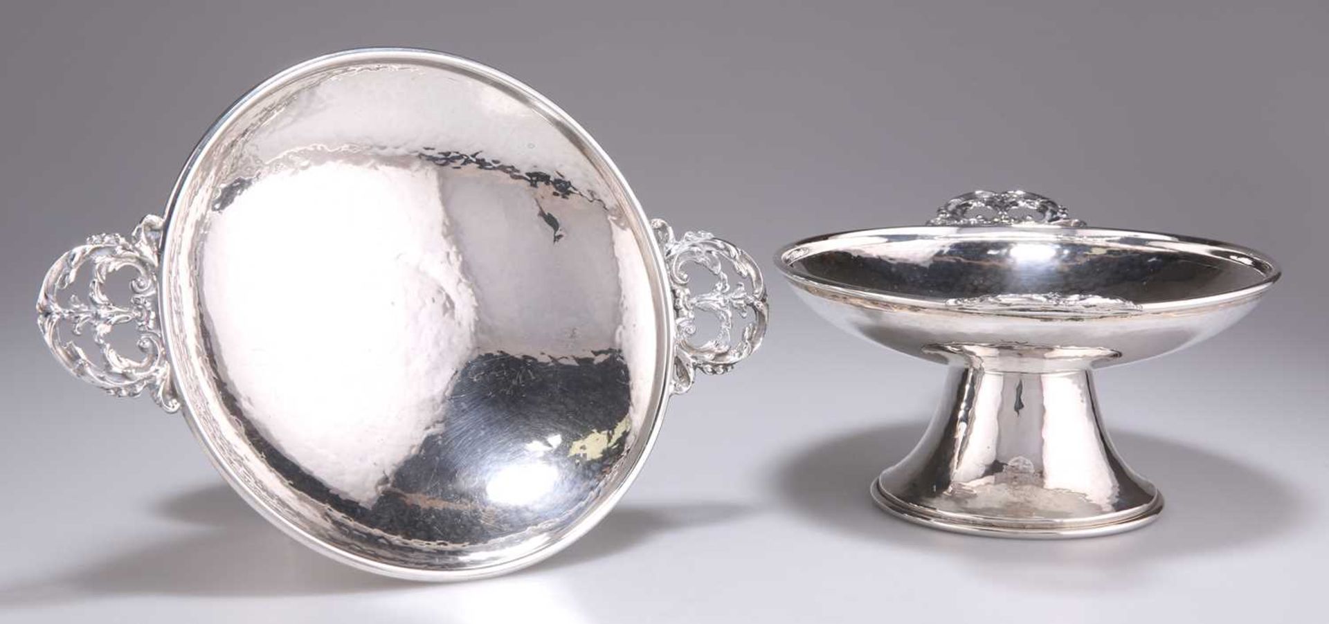 A PAIR OF ARTS AND CRAFTS SILVER TAZZAS