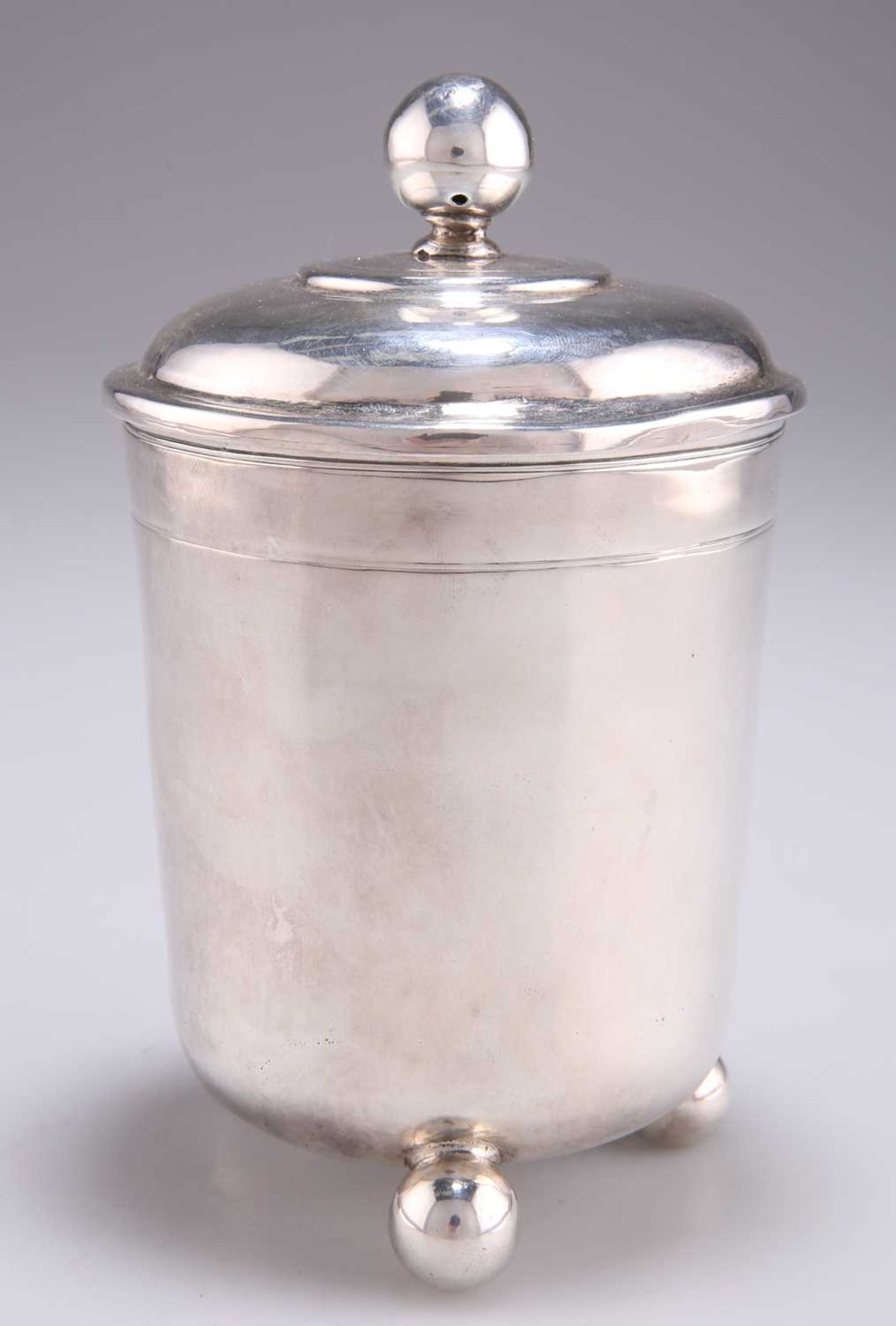 A GERMAN SILVER BEAKER AND COVER